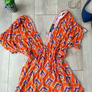 T-Bags orange deep V geometric top
